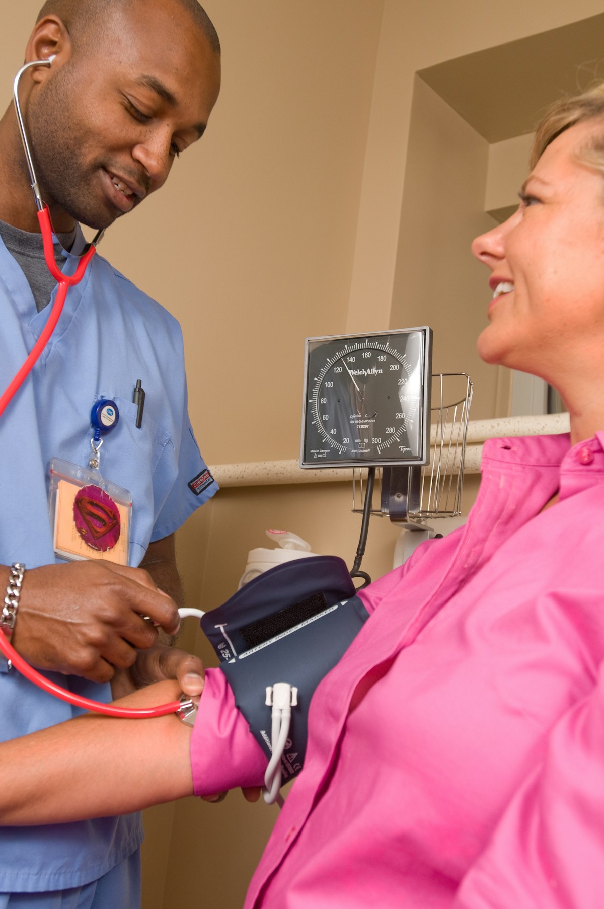 A nurse caring for a patient at Assisi Atonement Hospital